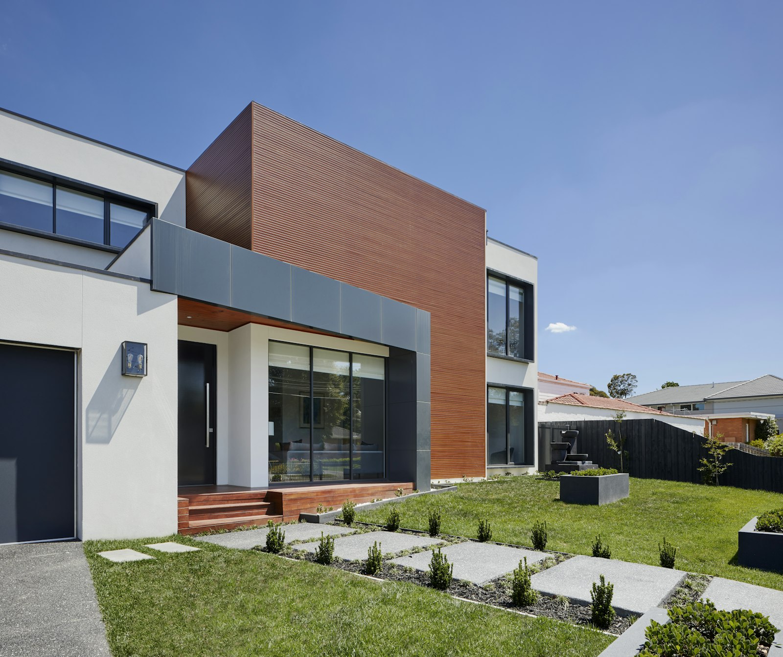 Véranda moderne accolée à la maison